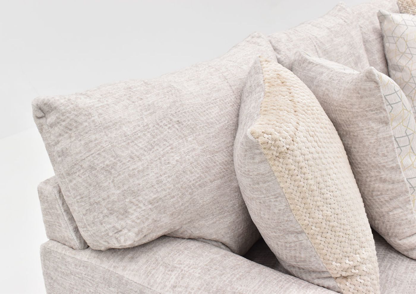 Closeup View of the Back and Pillows on the Gabriella Loveseat in Off-White by Albany Industries | Home Furniture Plus Bedding