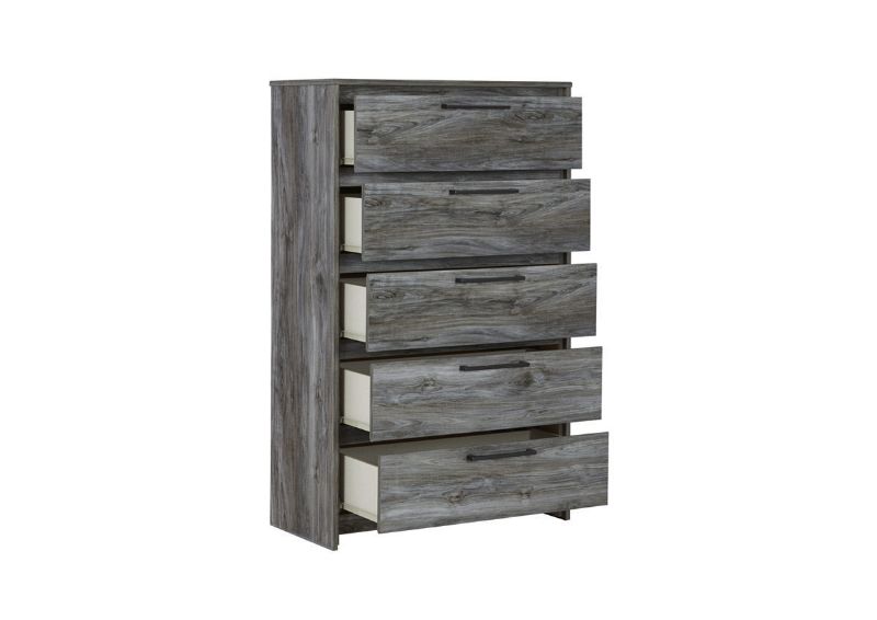 Slightly Angled View  of the Baystorm Chest of Drawers in Gray by Ashley Furniture | Home Furniture Plus Bedding