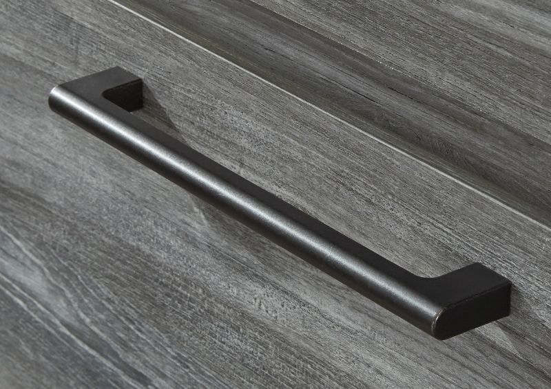 Close Up View of the Handle on the Baystorm Nightstand in Gray by Ashley Furniture | Home Furniture Plus Bedding