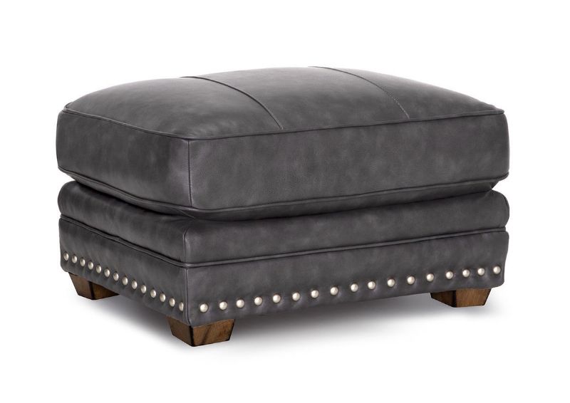 Slightly Angled View  of the Della Leather Ottoman in Gray by Franklin Corporation | Home Furniture Plus Bedding