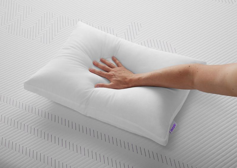  View of a Hand Pressing Down on the Purple Cloud Standard Pillow | Home Furniture Plus Bedding