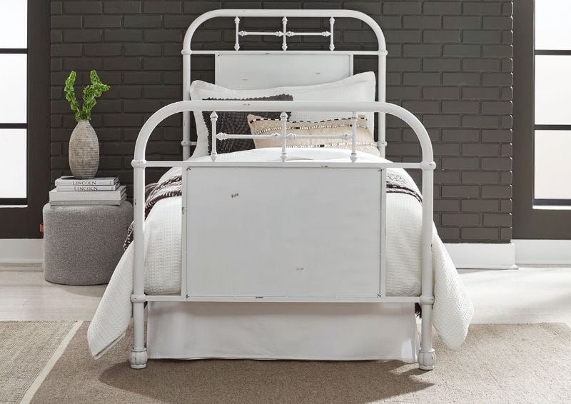 View from the Foot of the Vintage Twin Size Metal Bed in White by Liberty Furniture | Home Furniture Plus Bedding