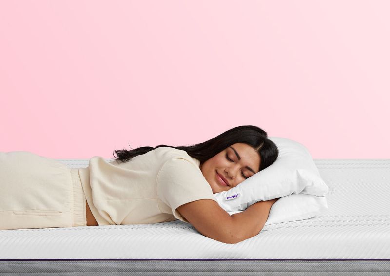 View of a Woman Sleeping on the Purple Cloud Standard Pillow | Home Furniture Plus Bedding