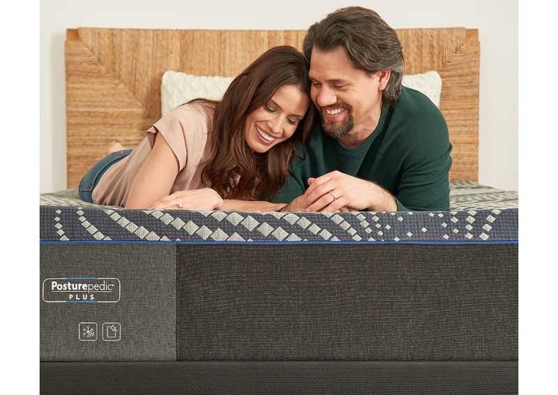 Lifestyle View of a Man and Woman on the Sealy Albany Plush Mattress | Home Furniture Plus Bedding