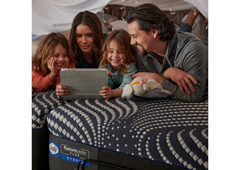 Lifestyle View of a Family on the High Point Firm Hybrid Mattress | Home Furniture Plus Bedding