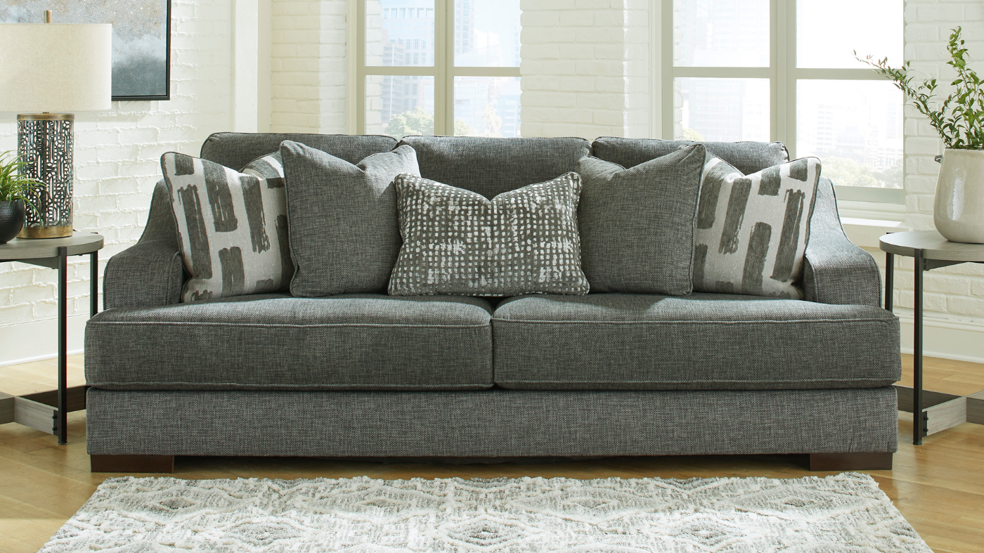 Lessinger Sofa with Pewter Gray Upholstery in Room Setting | Home Furniture Plus Bedding