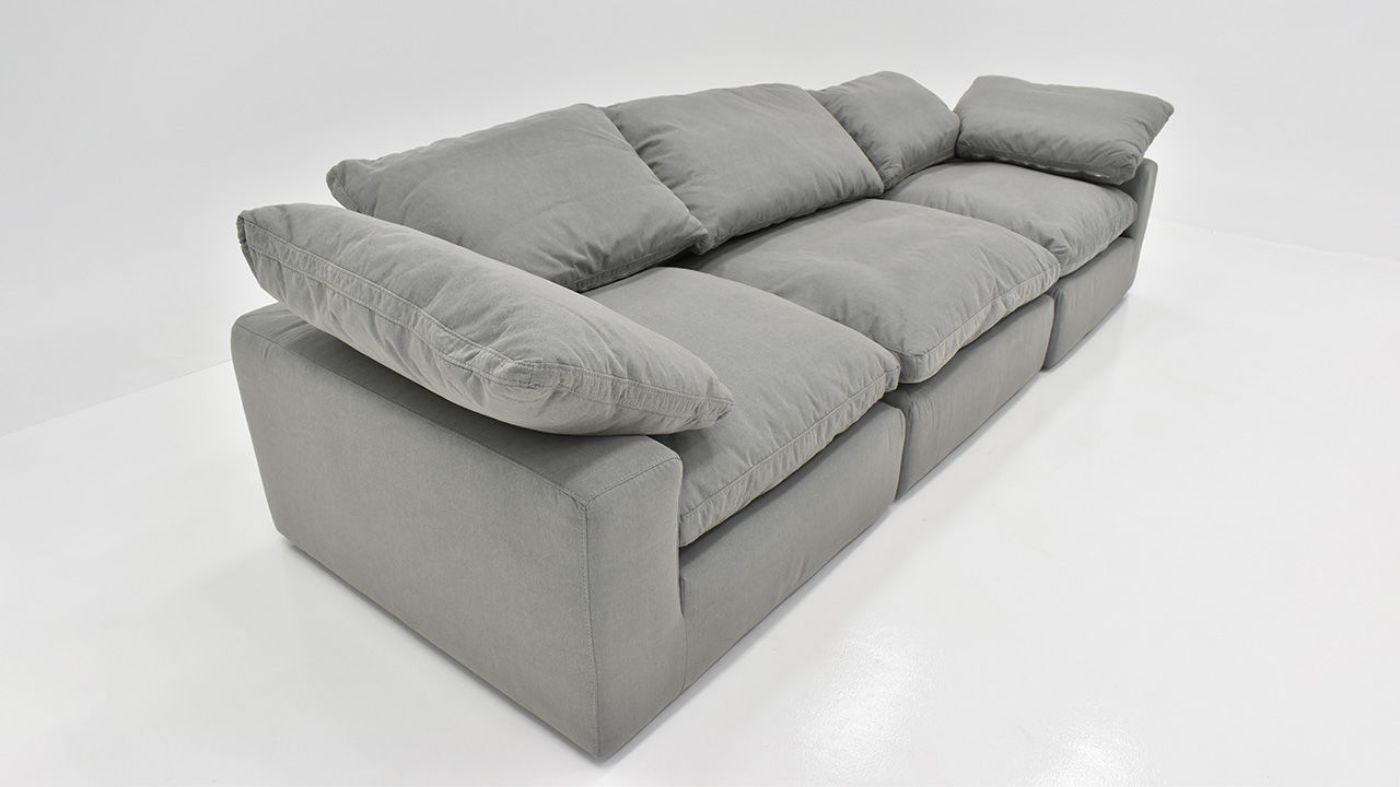 Angled View of the Cloud Sofa in Gray by KUKA Home | Home Furniture Plus Bedding