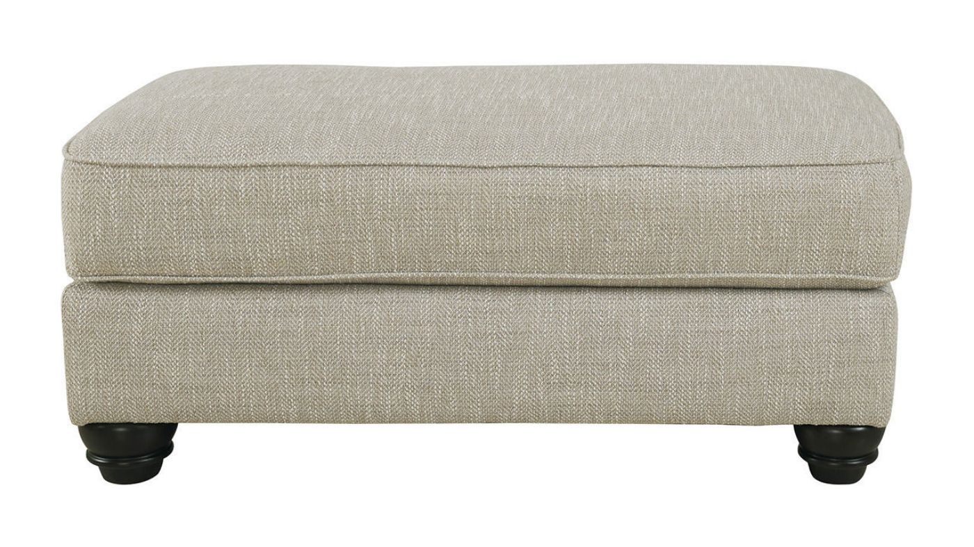 Front Facing View of the Asanti Ottoman in Gray by Ashley Furniture | Home Furniture Plus Bedding