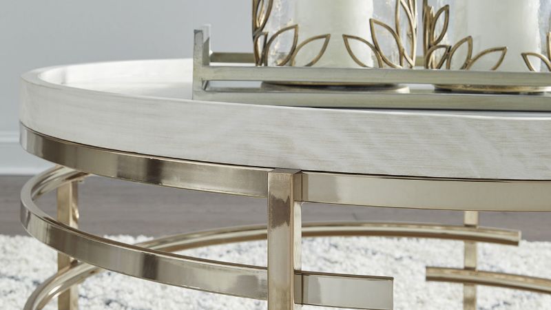 Close Up View of the Top of the Montiflyn Coffee Table in Off-White and Gold by Ashley Furniture | Home Furniture Plus Bedding