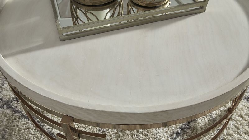  View of the Top of the Montiflyn Coffee Table in Off-White and Gold by Ashley Furniture | Home Furniture Plus Bedding