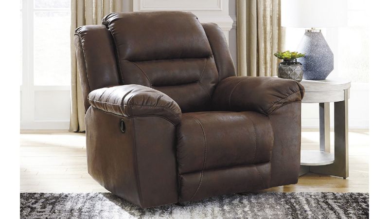 Room View of the Stoneland Rocker Recliner in Brown  by Ashley Furniture | Home Furniture Plus Bedding
