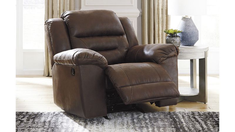 Room View of the Stoneland Rocker Recliner in Brown with Opened Footrest by Ashley Furniture | Home Furniture Plus Bedding