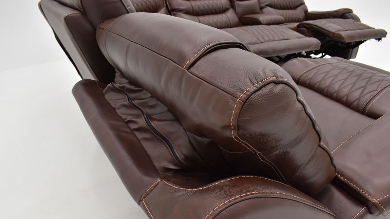 Close Up View of the Headrest on the Elliot POWER Leather Reclining Sectional Sofa in Brown by Man Wah | Home Furniture Plus Bedding