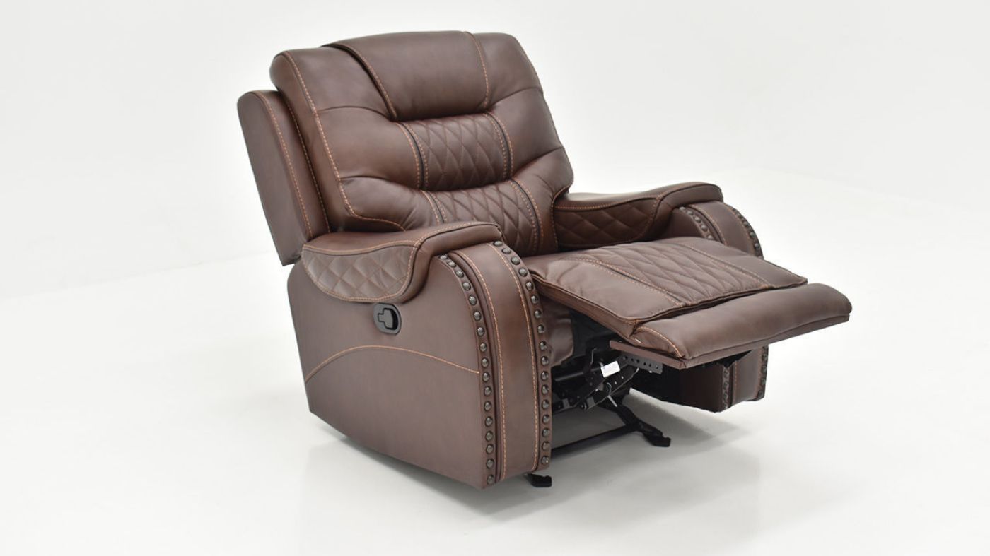 Slightly Angled View of the Elliot Leather Glider Recliner in Brown by Man Wah | Home Furniture Plus Bedding