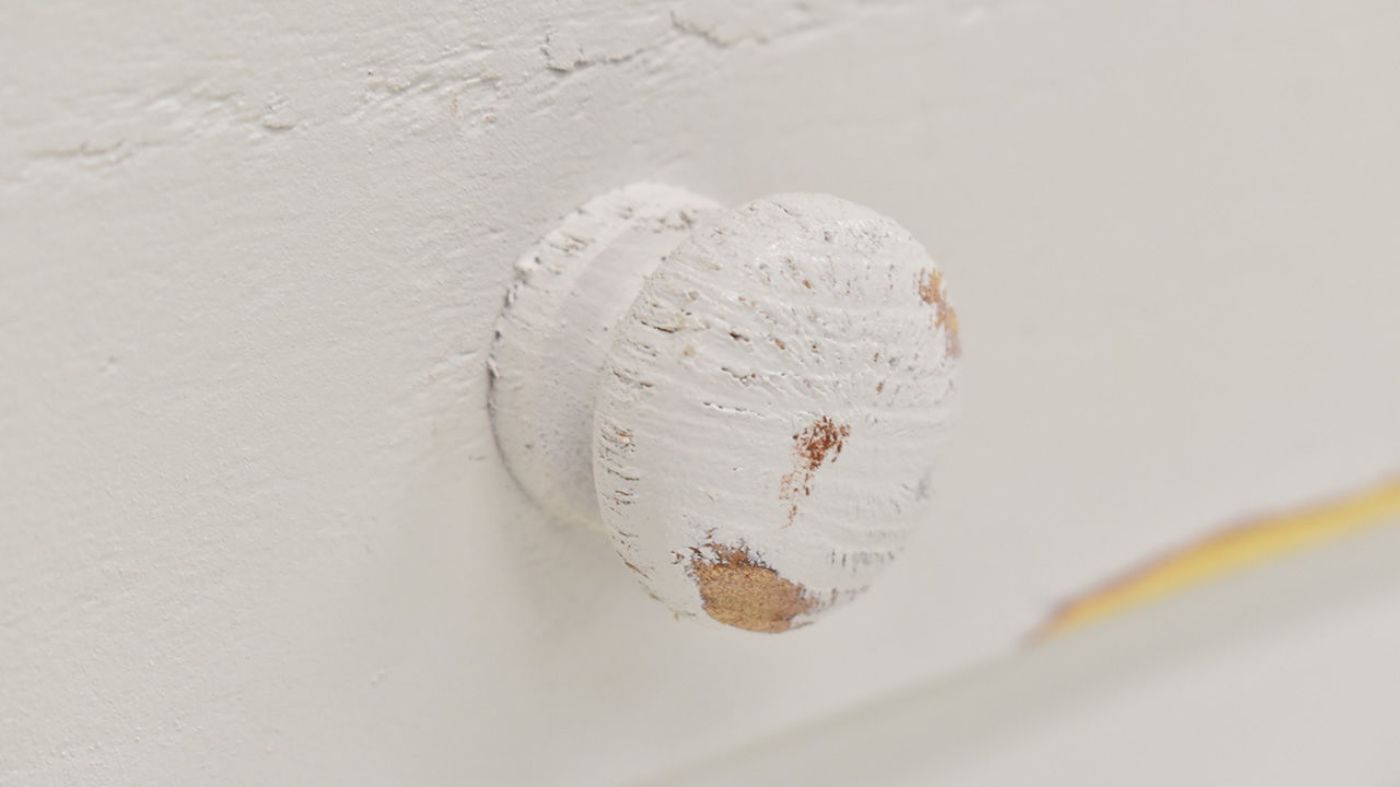 Close Up View of the Knob on the Chalet Man's Chest in White by Vintage Furniture | Home Furniture Plus Bedding