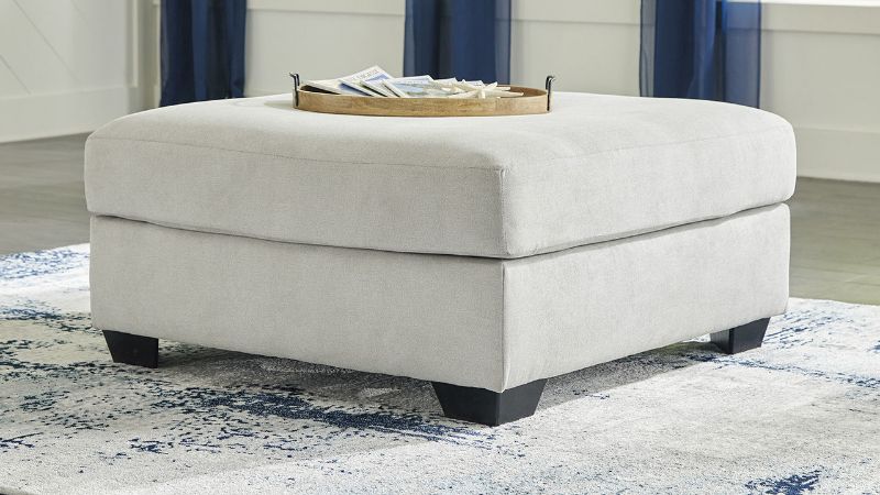 Room View of the Lowder Ottoman in Stone Gray by Ashley Furniture  |Home Furniture Plus Bedding