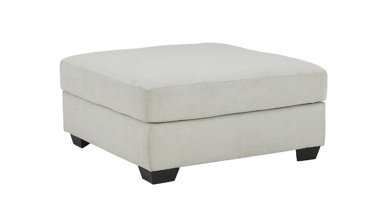 Angled View of the Lowder Ottoman in Stone Gray by Ashley Furniture  |Home Furniture Plus Bedding