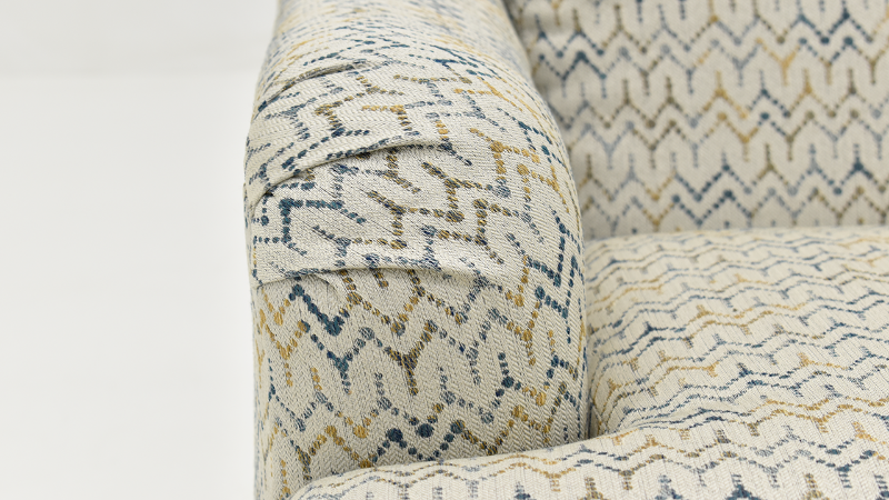 Front Close Up View of the Arm of the Feather Accent Chair in a Multicolored Pattern by Behold Home | Home Furniture Plus Bedding