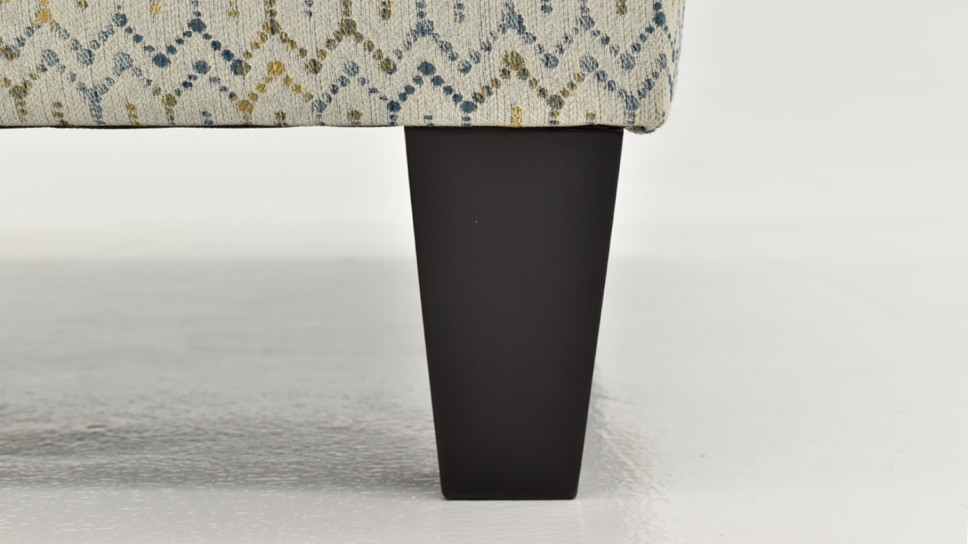 Close Up View of the Leg of the Feather Accent Chair in a Multicolored Pattern by Behold Home | Home Furniture Plus Bedding