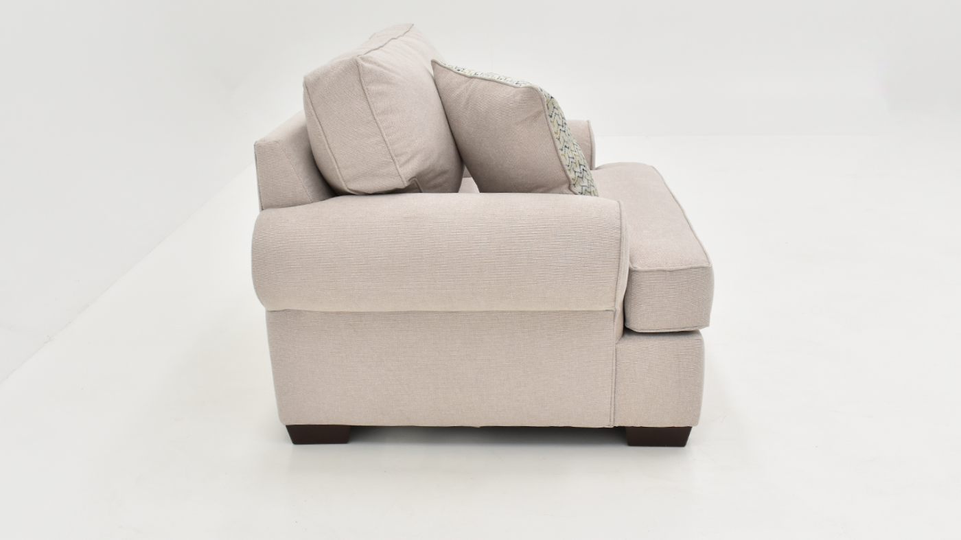 Side View of the Feather Chair in Off-White by Behold Home | Home Furniture Plus Bedding