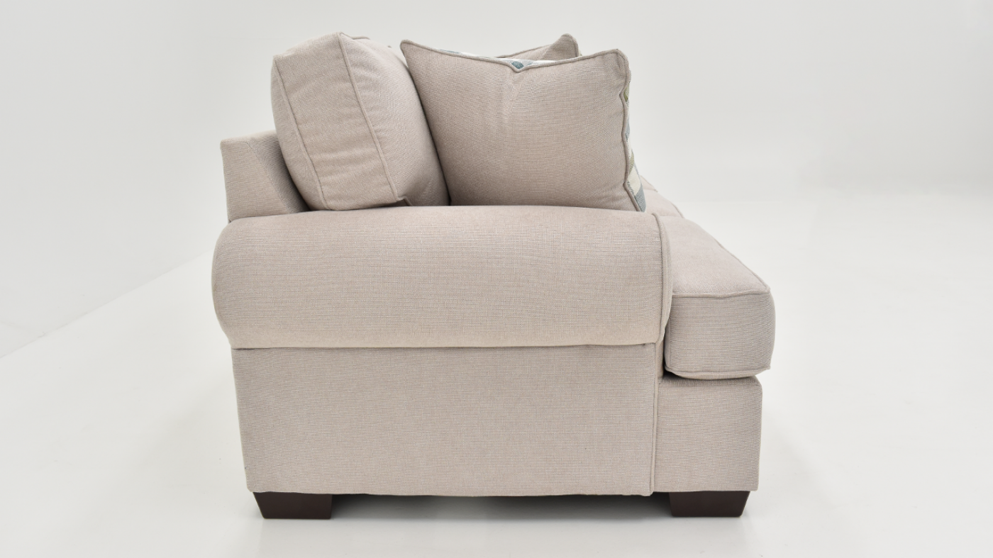 Side View of the Feather Sofa in Off-White by Behold Home | Home Furniture Plus Bedding