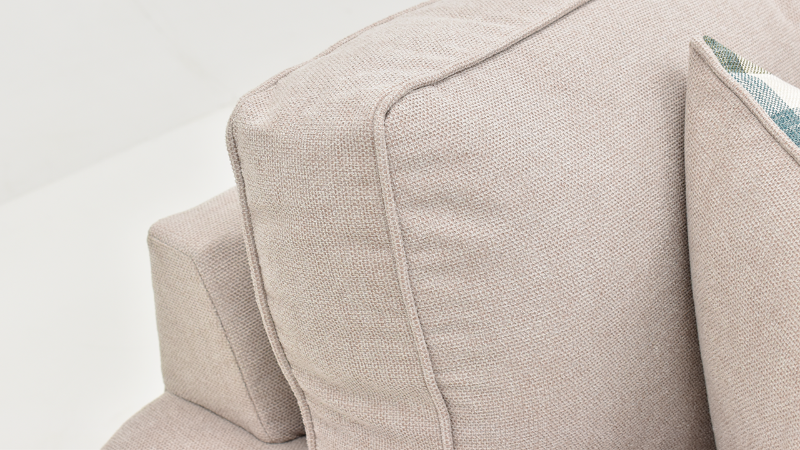 Close Up View of the Upper Back Cushion on the Feather Sofa in Off-White by Behold Home | Home Furniture Plus Bedding