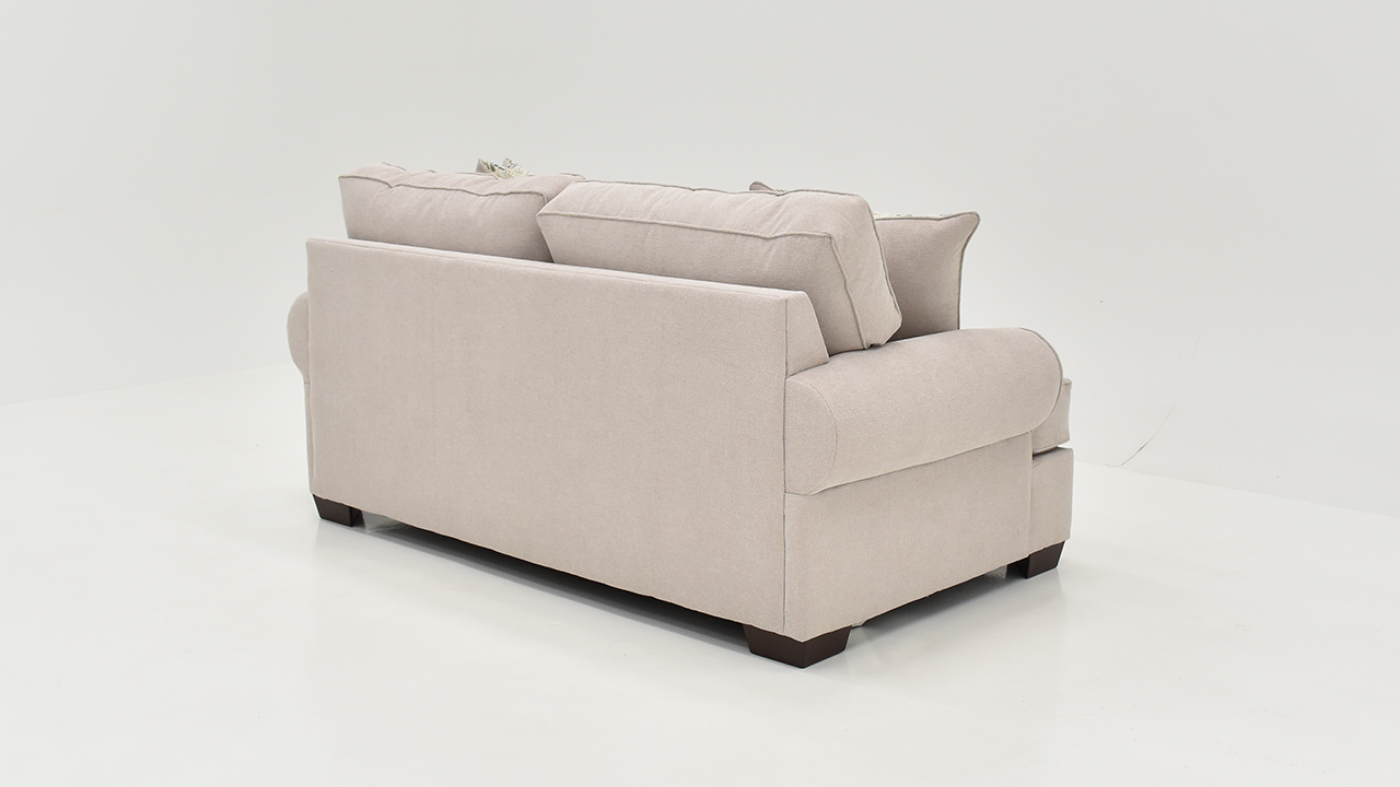 Slightly Angled Rear  View of the Feather Loveseat in Off-White by Behold Home | Home Furniture Plus Bedding