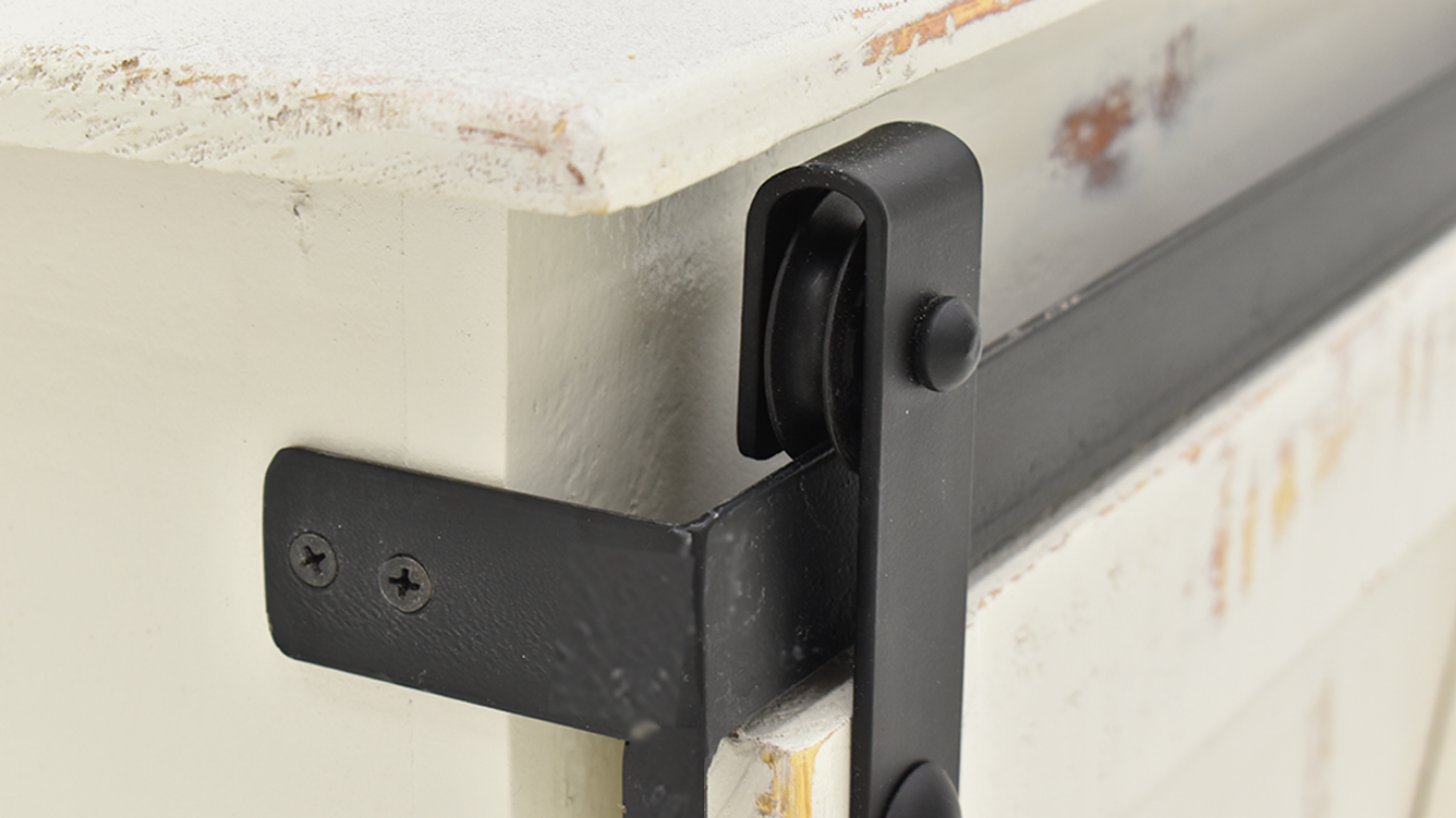 Close Up of the Black Metal Hardware on the Collins TV Stand Console - White | Home Furniture Plus Bedding
