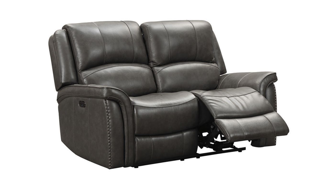Slightly Angled Open View of the Gaspar POWER Reclining Leather Loveseat in Gray by Ashley Furniture | Home Furniture Plus Bedding