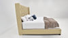 Side View of the Morrow Queen Upholstered Bed in Natural Tan by Elements International | Home Furniture Plus Bedding
