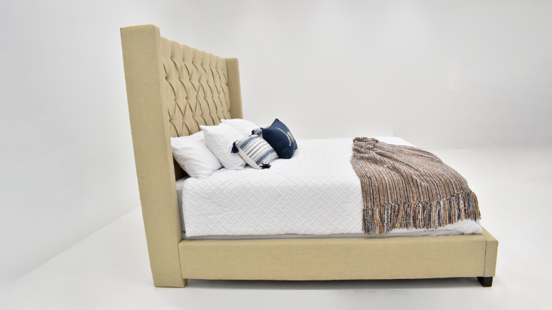 Side View of the Morrow Queen Upholstered Bed in Natural Tan by Elements International | Home Furniture Plus Bedding