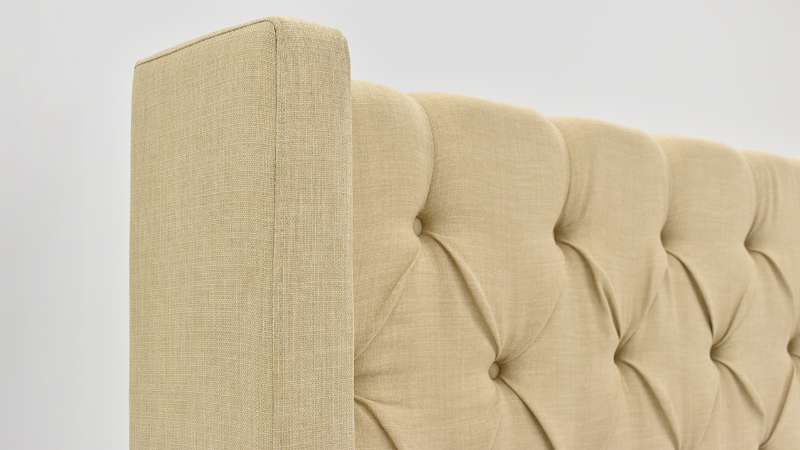 Closeup Headboard View of the Morrow King Upholstered Bed in Natural Tan by Elements International | Home Furniture Plus Bedding