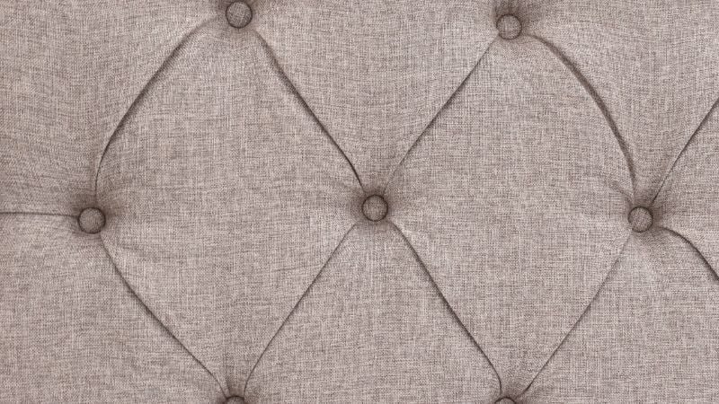 Closeup View of the Button Tufting on the Morrow Queen Upholstered Bed in Gray by Elements International | Home Furniture Plus Bedding