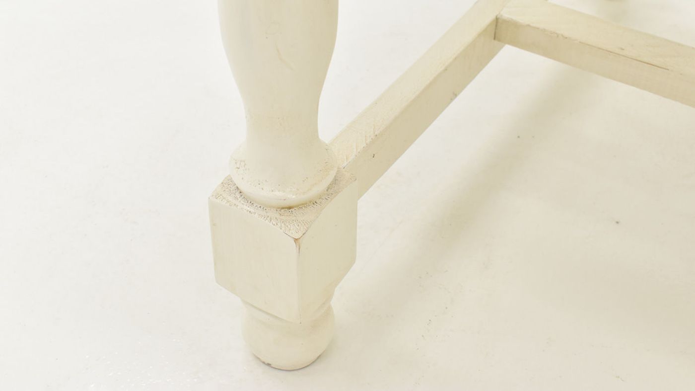 Close Up of the Leg on the Bellevue Coffee Table in Off-White by Vintage Furniture | Home Furniture Plus Bedding