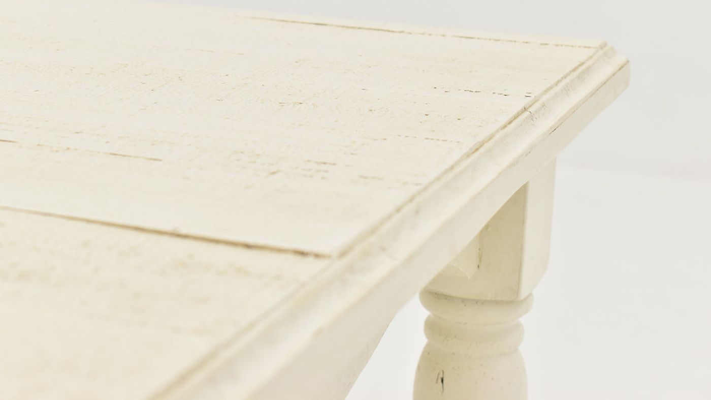Close Up of the Planked Top and Corner on the Bellevue Coffee Table in Off-White by Vintage Furniture | Home Furniture Plus Bedding