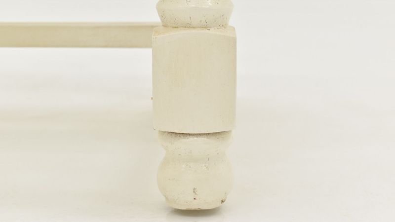 Close Up View of the Leg on the Bellevue End Table in Off-White by Vintage Furniture | Home Furniture Plus Bedding