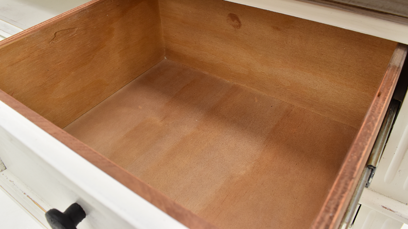 Close Up of the Interior of the Drawers on the Charleston TV Stand Console Cabinet - White | Home Furniture Plus Bedding	