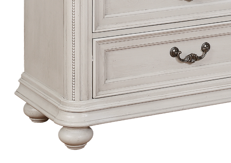 Close up of the Bottom Corner of the White Keystone Chest of Drawers | Home Furniture Plus Mattress