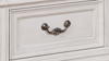 White Keystone King Size Bedroom Set by Avalon Showing the Drawer Pull on the Nightstand | Home Furniture Plus Bedding