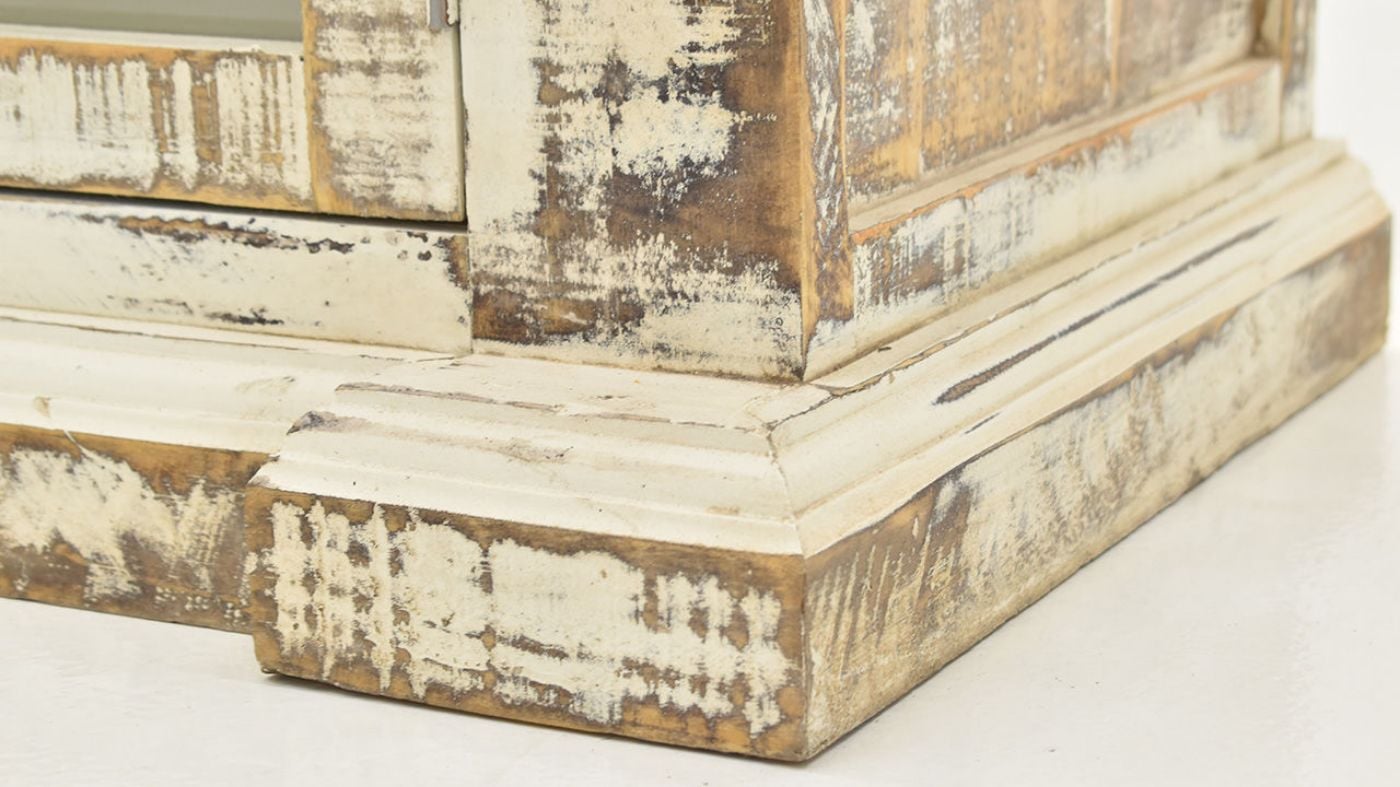 Close Up View of the Bottom of the Maverick 4 Door Buffet Cabinet in Off-White by Vintage Furniture | Home Furniture Plus Bedding