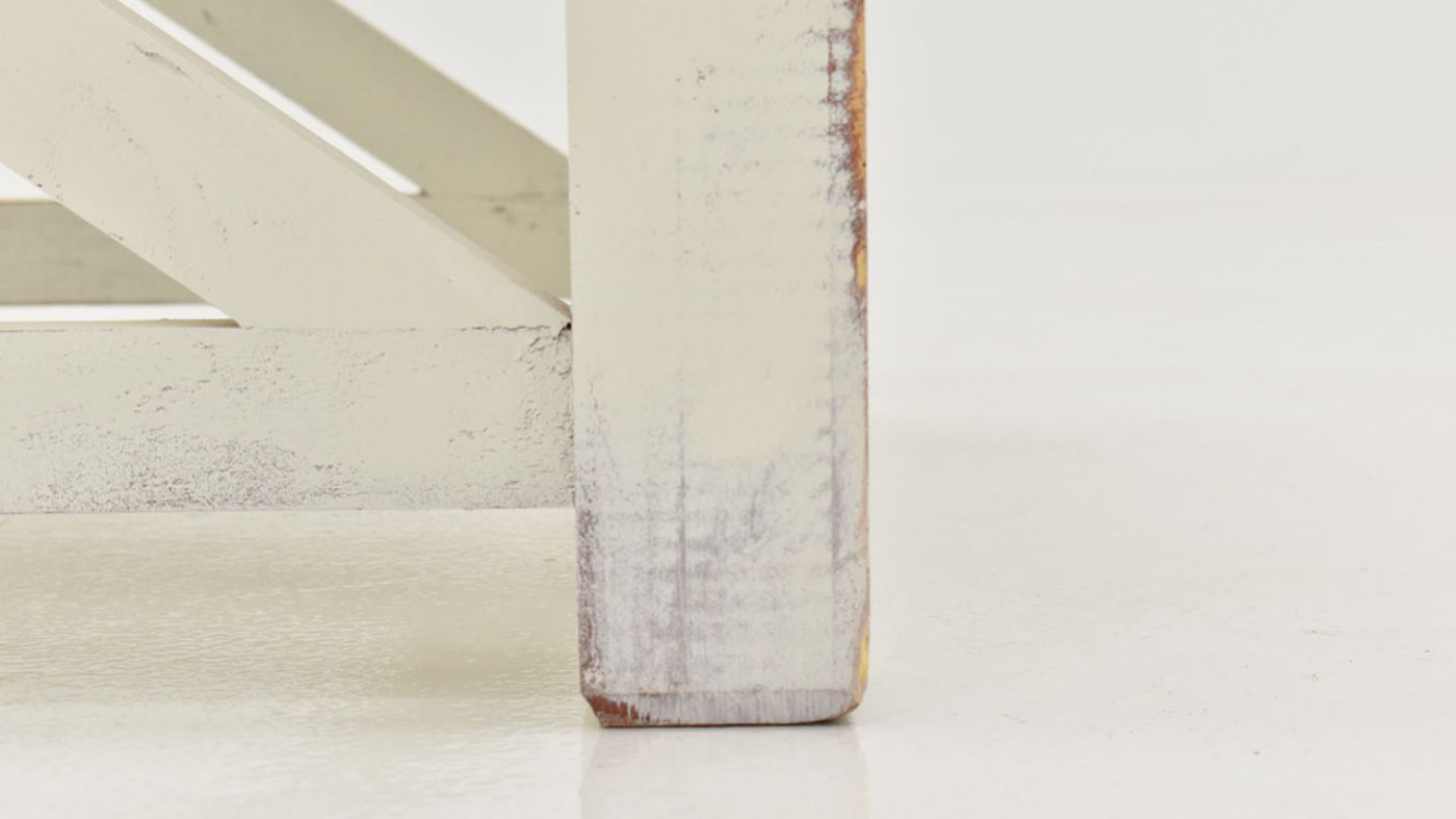 Close Up View of the Leg on the Spencer Coffee Table in Off-White by Vintage Furniture |Home Furniture Plus Bedding