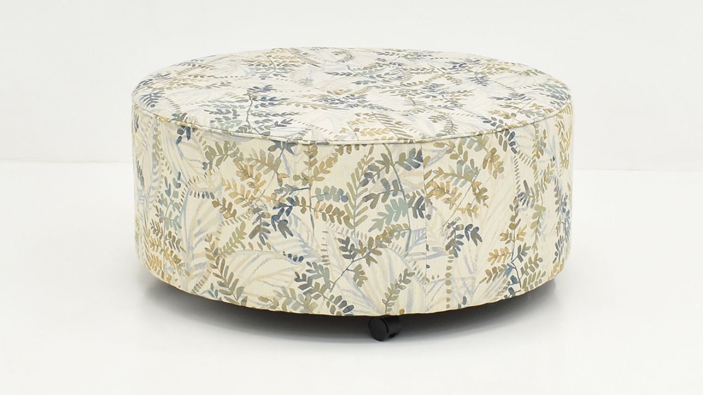 Side View of the Multicolored Feather Ottoman by Behold Home | Home Furniture Plus Bedding