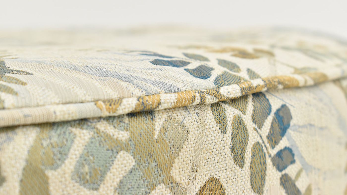 Close Up View of the Multicolored Feather Ottoman by Behold Home | Home Furniture Plus Bedding