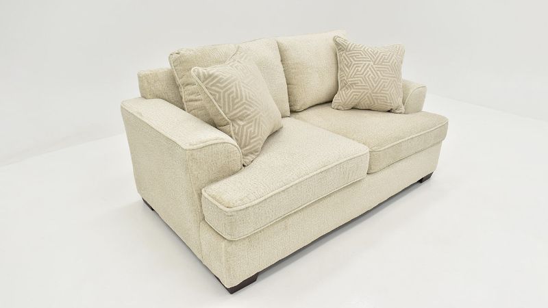 Slightly Angled View of the Ritzy Loveseat in Off-White by Behold Home | Home Furniture Plus Bedding