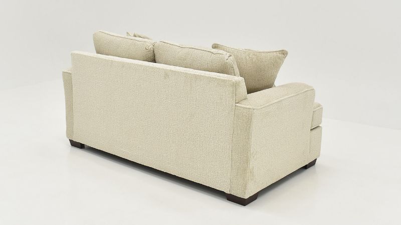 Slightly Angled Rear View of the Ritzy Loveseat in Off-White by Behold Home | Home Furniture Plus Bedding