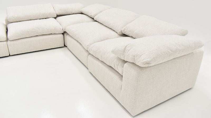 Angled Side View of  the Cloud Sofa Sectional Sofa with Chaise in Off White by KUKA Home | Home Furniture Plus Bedding