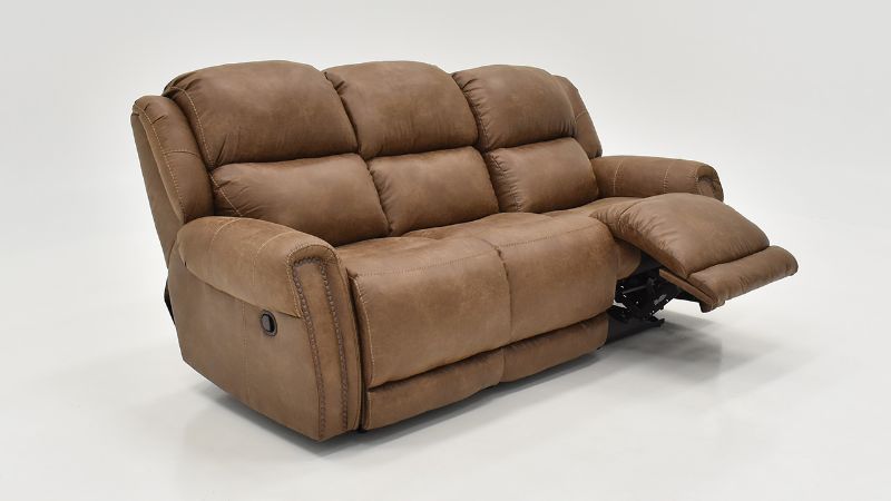 Angled Reclined View of the Maverick Reclining Sofa in Brown by HomeStretch | Home Furniture Plus Bedding