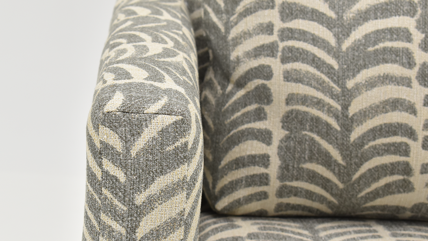Front Arm View of the St. Charles Swivel Chair in Gray by Behold Home | Home Furniture Plus Bedding