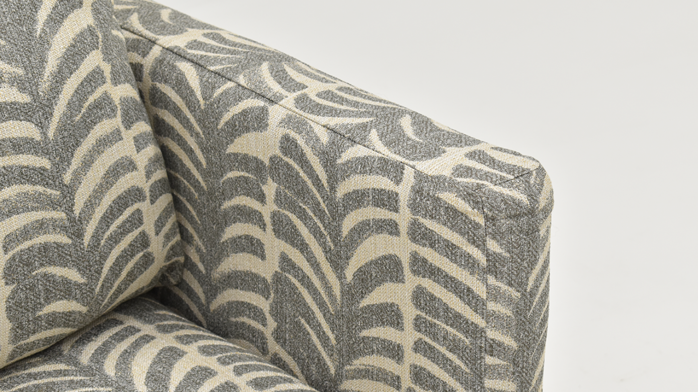 Angled Arm View of the St. Charles Swivel Chair in Gray by Behold Home | Home Furniture Plus Bedding