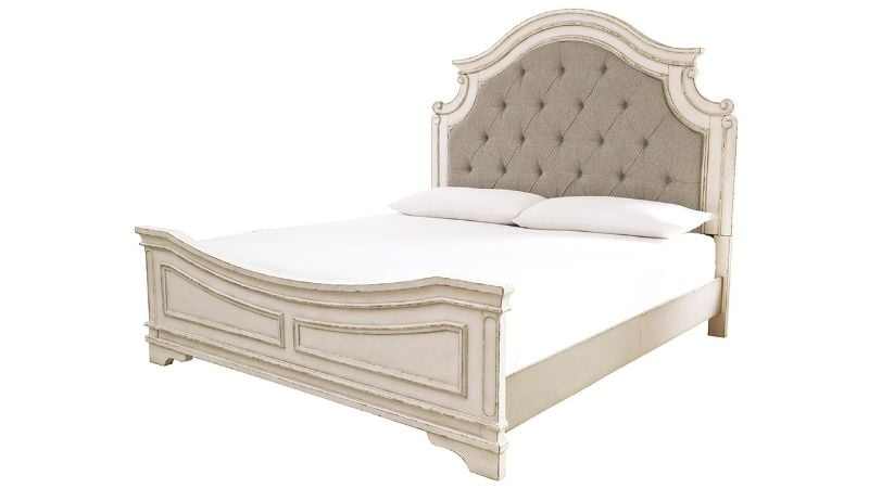 Slightly Angled View of the Realyn Queen Upholstered Panel Bed in Off White by Ashley Furniture | Home Furniture Plus Bedding